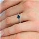 5 - Flavia Classic Round Center Blue Diamond Accented with White Diamond Criss Cross Engagement Ring 
