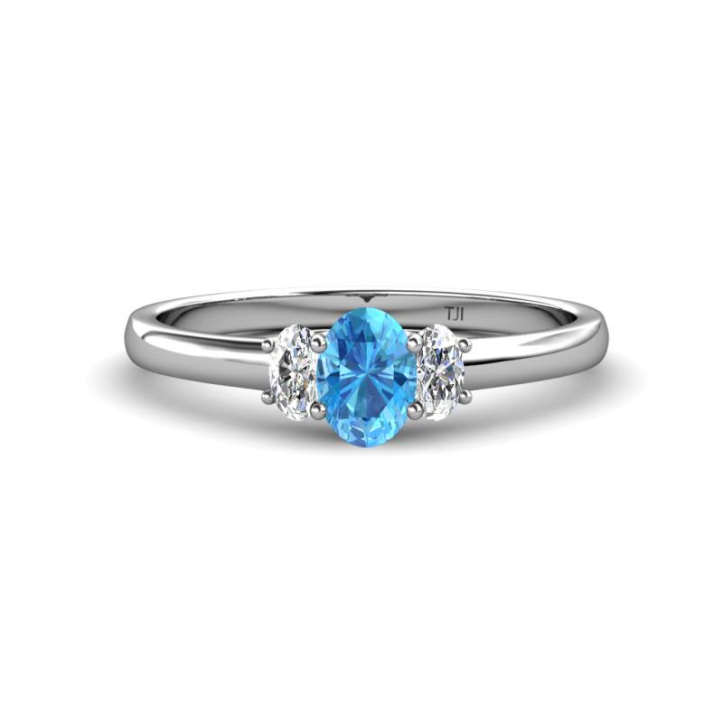 Gemma 7x5 mm Oval Cut Blue Topaz and Lab Grown Diamond Trellis Three Stone Engagement Ring 